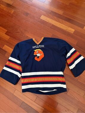 The Simpsons Men's Navy 'Hellfish' Striped Hockey Jersey with Mascot Graphic